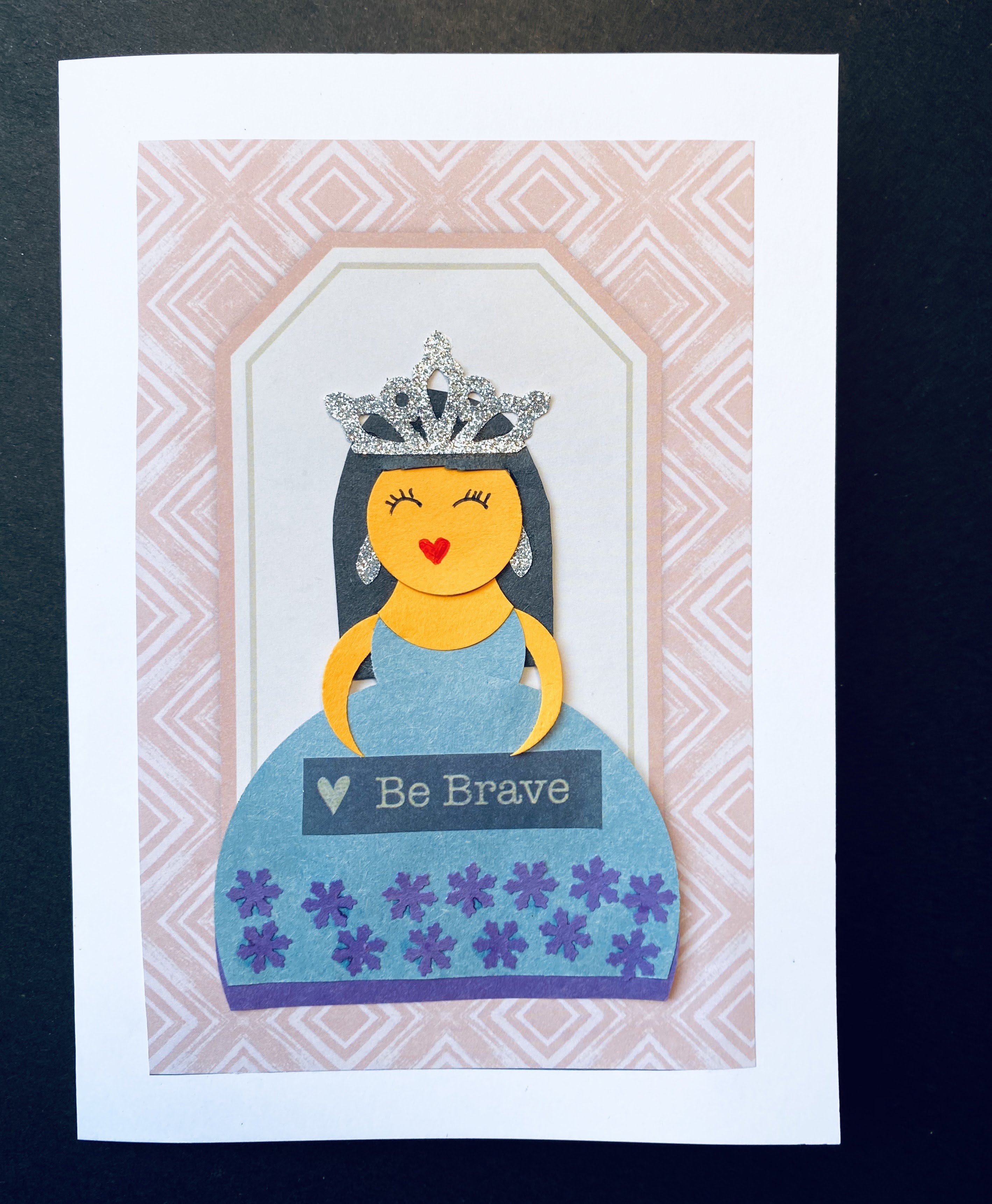 The final results of our "be brave" princess card made from paper.  She seeks to encourage the recipient of the card to be brave!