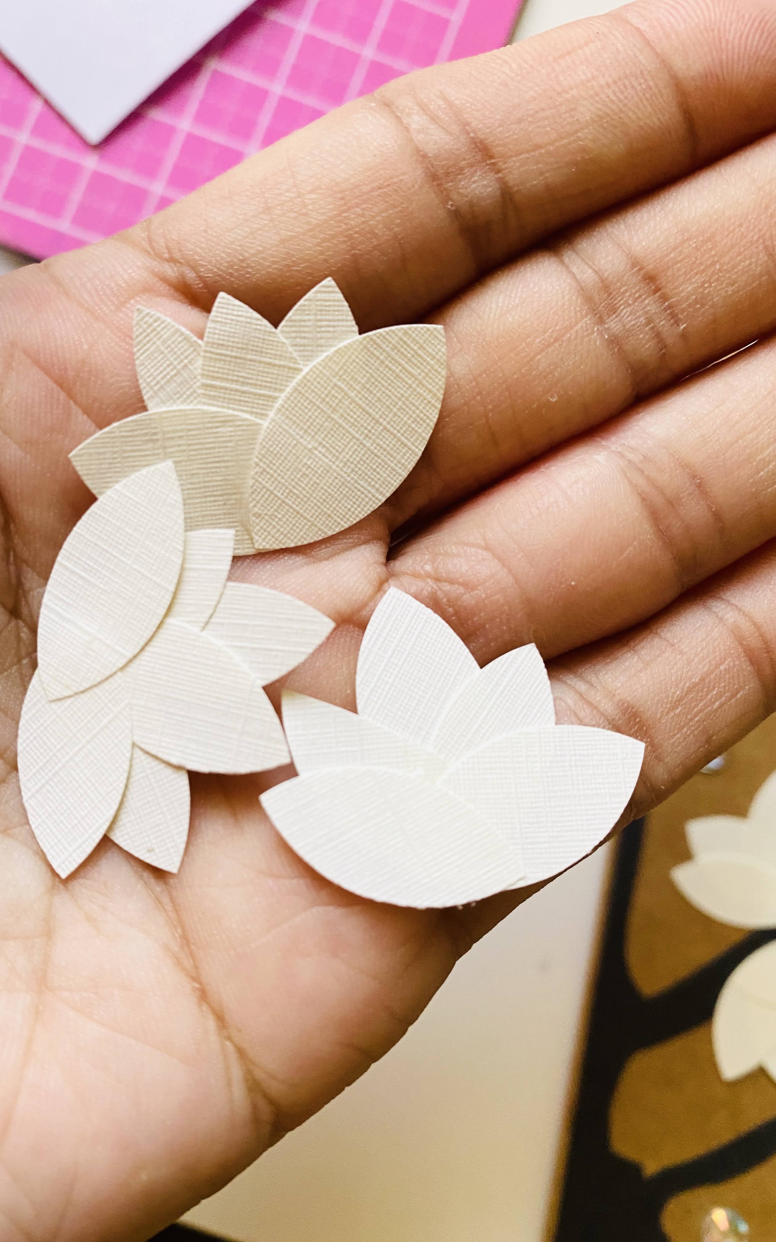 How to make paper magnolias using textured paper for petals.